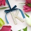 Elegant Pearl Initial Ornament - K