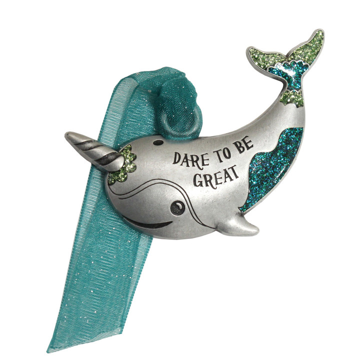 Adorable vintage pewter Christmas ornament in the shape of a smiling baby narwhal with hand-painted gold and aqua enamel and the message "Dare to Be Great".