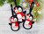 Personalised Penguin Hanging Decoration for your Christmas Tree. The female penguins will be finished off with a red scarf and a tiny red & white bow too. Made from layers of felt and a little padded to give them a 3D look. They also have a red ribbon so that you can hang them up on your Christmas tree
