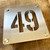 Stainless steel house number sign.