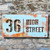 Painted and distressed Corten steel house name and number