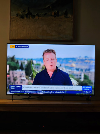 TV in use with screen protector fitted, showing no reduction in picture quality