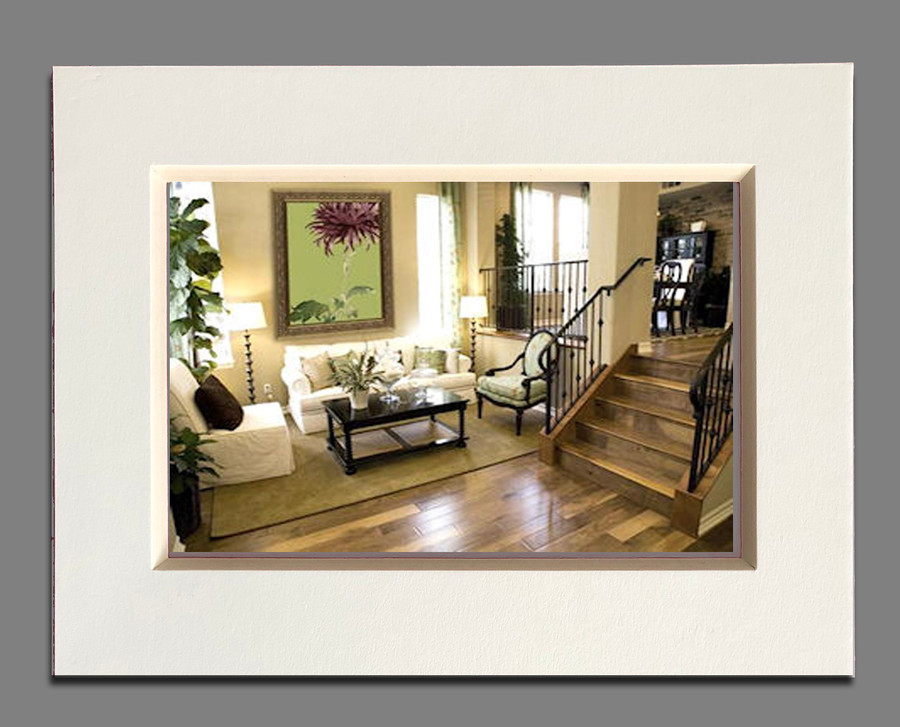 Why does adding a mat and/or frame enhance art or photographs