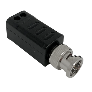 A close-up side view of a single video balun, showing the BNC connector and the secure screw terminals.