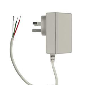 Top side view of the 18V AC power adaptor looking left with tinned cables visible.