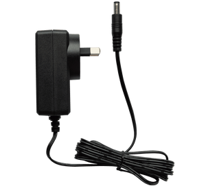 Top side view of transformer looking left displaying Australian pins coiled cable and output plug