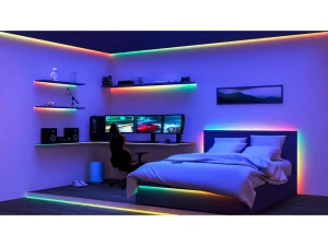 WiZ Gradient LED strip in a gaming bedroom setup, multicolour lighting along shelves, desk and bed frame