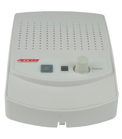 Front angled view of the Universal Ringer controller, showing the power button, volume knob, and connection ports. Front angled view of the Universal Ringer controller, showing the power button, volume knob, and connection ports.