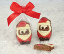7733 Praline Filled Santa Duo. Milk Chocolate Santa's filled with Nutty Praline