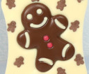 1051 White Chocolate Bar topped with Chocolate Gingerbread Characters