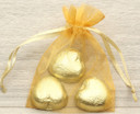 Organza Bags in gold for wedding favours or table gifts for company events, birthday parties or other celebrations