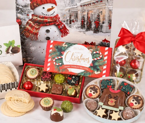 • 8 Choc Garland Gift Box
• Milk Chocolate Nutcracker Duo
• Shortbread Biscuits
• Dark Chocolate Peppermint Creams
• Christmas Chocolate Assortment
• Christmas Oval filled with festive chocolates