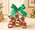 7821 Santa & Elf Filled Chocolate Star with Green Bow