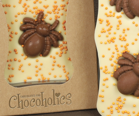 Milk Chocolate Spiders on a White Bar