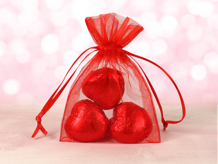 Red Sheer Bag with Three Red Chocolate Hearts