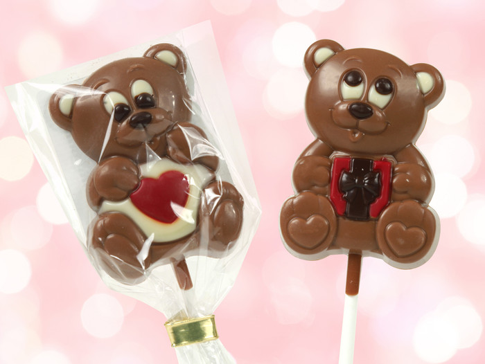 Loving Teddy Milk Chocolate Lolly holding a Heart or Valentines Present