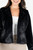 Chaqueta corta con cuello redondo