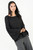 Blusa manga larga acampanada en gasa con escote ojal
