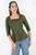 Polo manga 3/4 en suede con escote cuadrado y silueta peplum