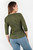 Polo manga 3/4 en suede con escote cuadrado y silueta peplum