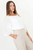 Blusa manga 3/4 en gasa hindu con escote ojal y mangas campana