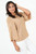 Blusa manga 3/4 en gasa hindu con escote ojal y mangas campana
