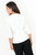 Blusa manga 3/4 en gasa crepe con cuello neru anatómico y escote V