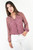 Blusa manga larga en gasa estampada con cuello neru anatómico y escote en V.