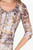 Polo manga 3/4 en tull mesh digital con escote V y ruffle