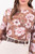 Blusa manga larga en rayon estampado con escote redondo y mangas abullonadas