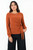 Blusa manga larga en tela Sophia con escote ojal y detalle de lazo