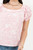 Blusa manga corta en Ghalia estampada con escote bote y mangas abullonadas