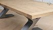 Quinn's sleek extendable table, designed for contemporary spaces, offers unmatched versatility.