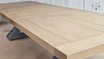 Quinn's table: A symbol of sophistication, extends to fit your lifestyle and dining preferences.