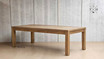 Angled view focusing on the detail and design of the table's solid oak leg
