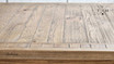 Side view of the table surface, emphasizing the oak’s texture and finish