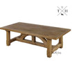Angle view of the Trailbridge coffee table, emphasising the unique design of the bridge-style legs and the table's robust construction