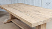 An angular shot focusing on the corners of the Charlested Oak Dining Table, displaying its robust construction