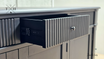 Inside view of an open drawer in the Louis Buffet with metal runner, showcasing its spaciousness and build quality