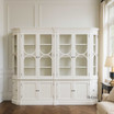 Front view of the Stonefield Double Display Cabinet Wall Unit with Angled Sides in situ in a Hamptons living room
