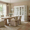 Showcasing angled display cabinets and storage cabinets, the Stonefield Double Display Cabinet Wall Unit with Angled Sides by Thomas and Hurley is shown here with the Sandringham Double Extension Dining Table and Carlyle Chairs.