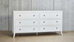 Angled view of the Piastri Chest displaying the three spacious drawers.