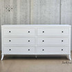 Front view of the Piastri 6 Drawer Chest showcasing its elegant white finish.