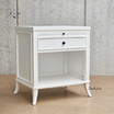 Angled shot displaying the precise joinery and classic design of the bedside table