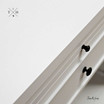 Close-up of the bedside table's surface, highlighting the finish and quality craftsmanship