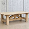 Side view of the Trailbridge Canyon Coffee Table revealing the unique craftsmanship and rustic charm of the oak legs.