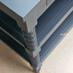 High-angle view emphasising the side table’s elegant design.