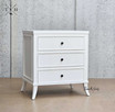 Angled view of Piastri 3 Drawer Bedside showcasing the three spacious drawers and an elegant silhouette.
