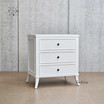 Angled shot displaying the precise joinery and classic design of the bedside table