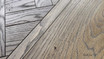 Detailed close-up of the oak texture and finish on the Bedford Burnished Oak Dining Table, showcasing the beautiful wood features